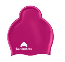 Load image into Gallery viewer, Hot pink Bumbathers ponytail swimcap designed to keep long hair dry
