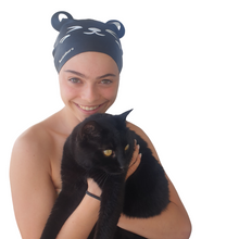 Load image into Gallery viewer, Black cat swimcap worn by girl holding black cat named Roxy
